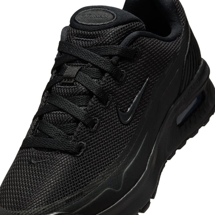 Youth black mesh upper close-up with lace system and swoosh detail