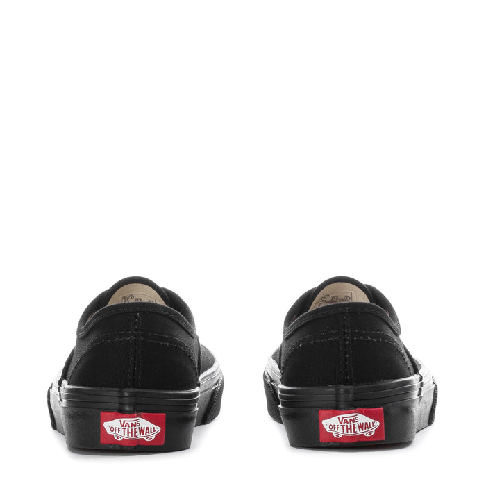 Kids black Vans lace-up sneaker back view with red "Off the Wall" label