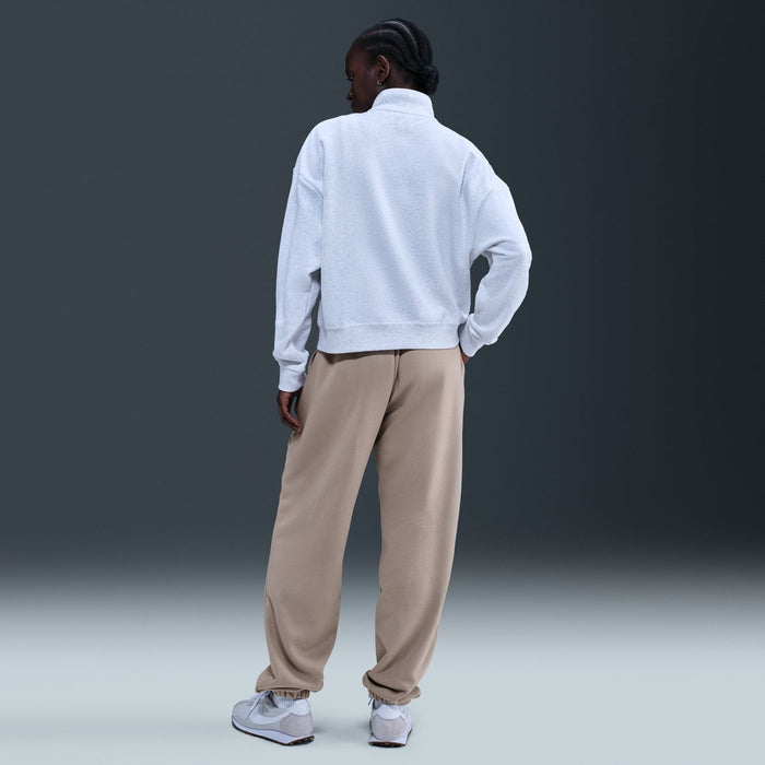 Women's fleece jogger pants in malt beige, back view with elastic waistband and cuffed hems