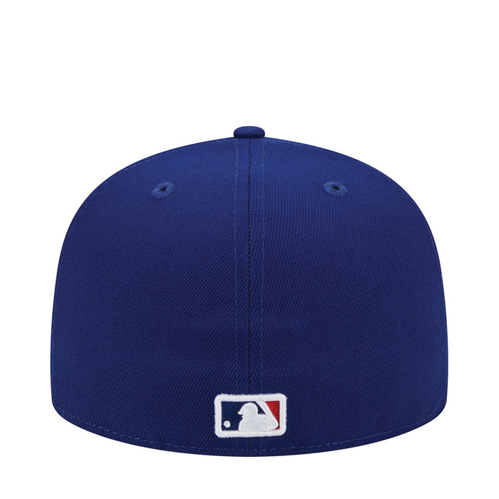 Royal blue baseball cap with MLB logo patch on back