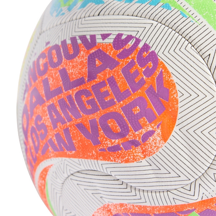 Multi-color FIFA competition ball close-up with orange and purple typographic graphics