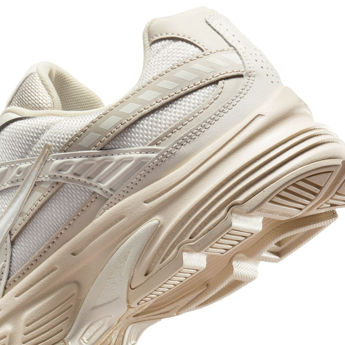 Womens sneaker midsole detail, ridged cream foam with stitched logo stripe