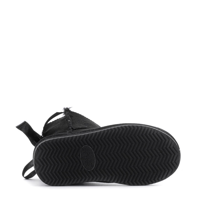 Black toddler boot outsole with zigzag tread and bow pull tab