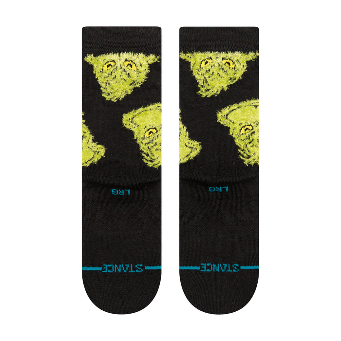 Youth crew socks, black with neon green character print and blue toe stripe