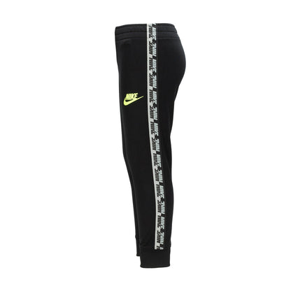 Kids black tricot track pants with side tape stripe and neon logo accents
