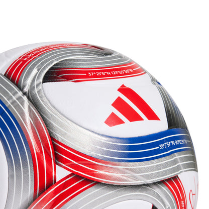 Close-up soccer ball panel with large red symbol, blue and red stripes, silver gray