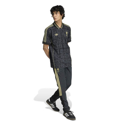 Men's navy Liverpool lifestyle jersey with gold adidas-style stripes and full-pattern front and back.