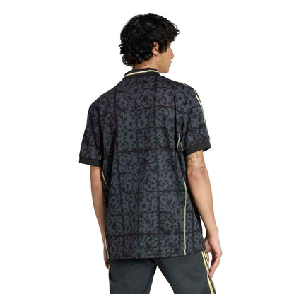 Men's navy Liverpool jersey back view with gold piping along the shoulders and sides.