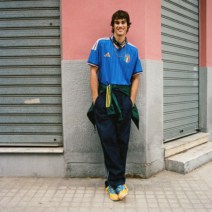 Mens blue Italy home soccer jersey with adidas logo and crest