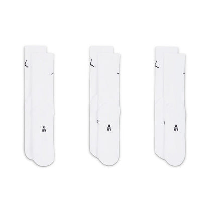 Three-pack white crew socks showing black Jumpman logos and ribbed cuffs