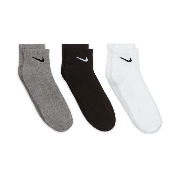 Three pairs of quarter crew socks in heather gray, black, and white with Nike swoosh