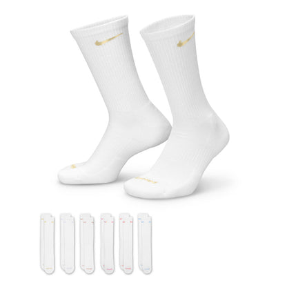 White cushioned crew socks with gold Nike Swoosh; two shown