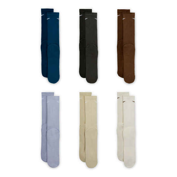 Six-pack unisex crew socks in assorted colors, shown folded upright