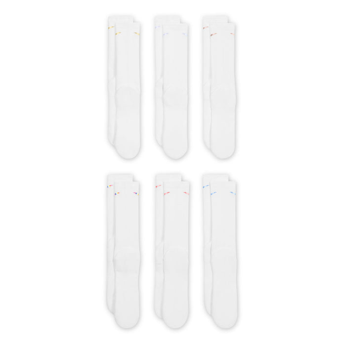 White cushioned crew socks with small multicolor Nike Swoosh; six socks shown