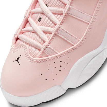 Kids high-top sneaker toe and laces, pink upper with black Jumpman logo and white sole