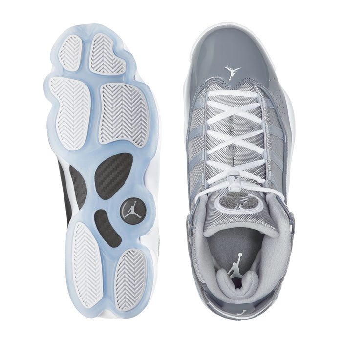 Grey and white mid-top sneaker sole and inside view, with laces and tongue label