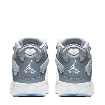 Heel view of grey and white mid-top sneakers with Air branding and pull tab