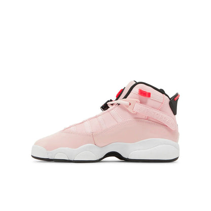 Youth pink high-top sneakers with black heel strap, white midsole, and red lace pull