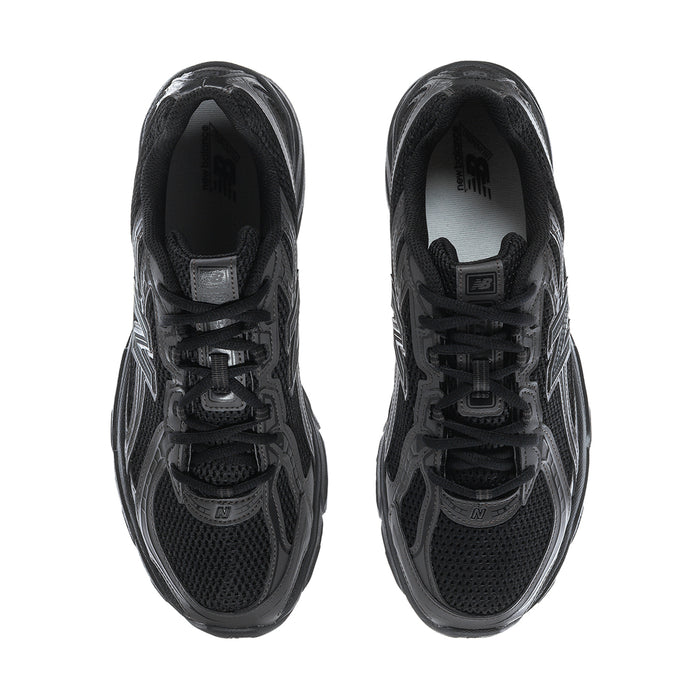 Pair of men's New Balance sneakers viewed from top, black mesh upper