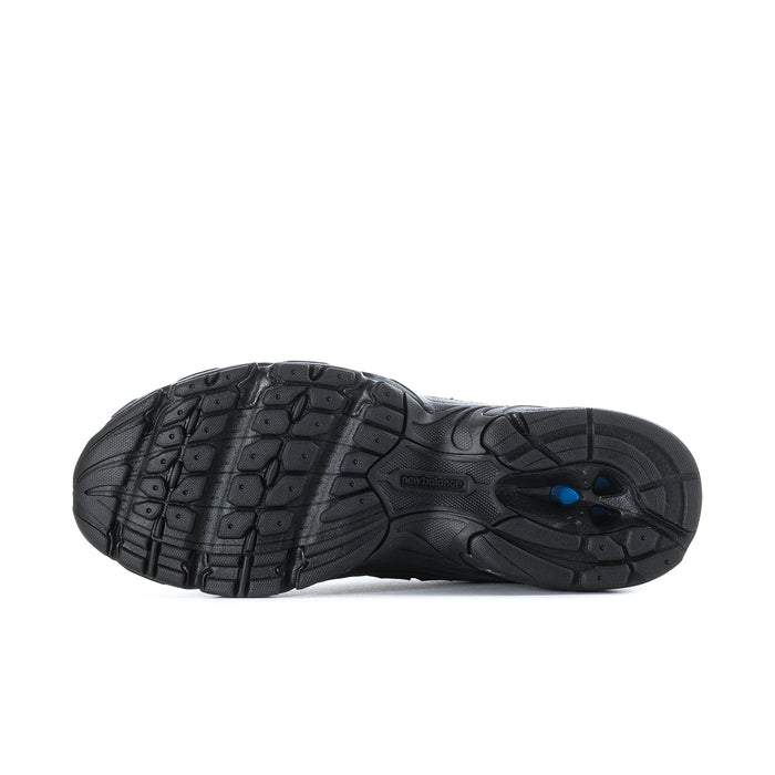 Men's New Balance sneaker outsole, black tread with blue forefoot detail