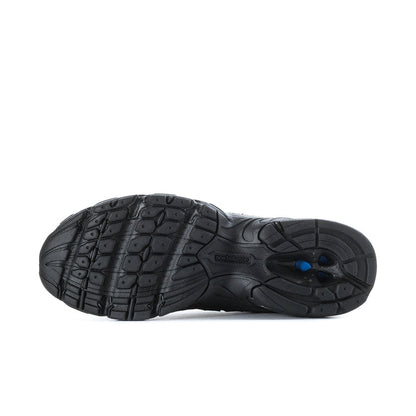 Men's New Balance sneaker outsole, black tread with blue forefoot detail