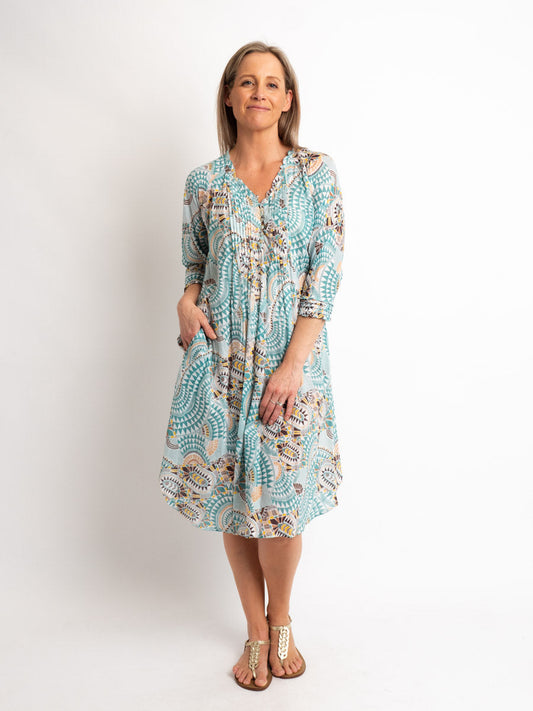 Knee-length Pleated Dress with Subtle Frills and 3/4 Raglan Sleeve in Aqua Geo