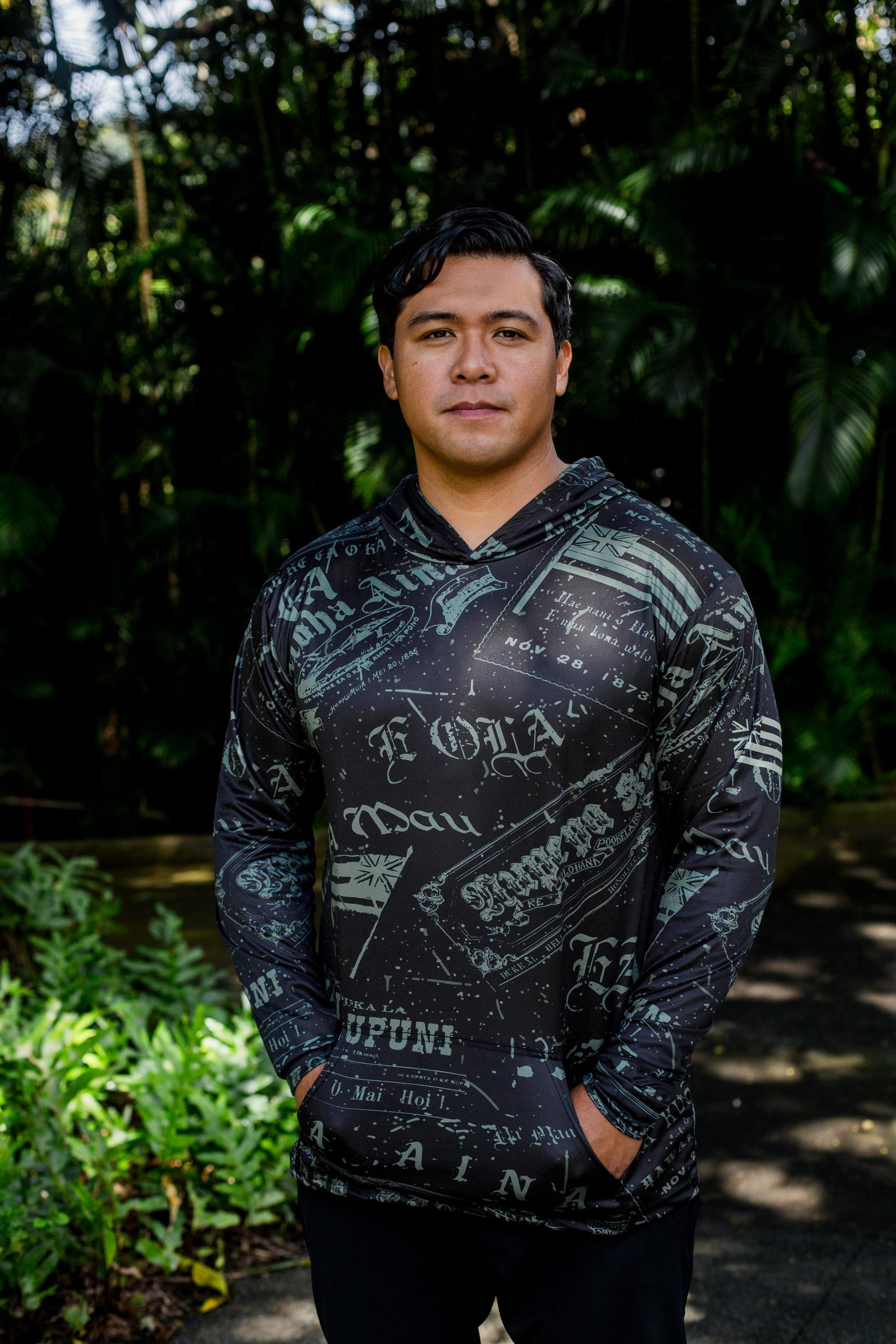 Nupepa Olelo Hawaii Hooded Long Sleeve Drifit Black