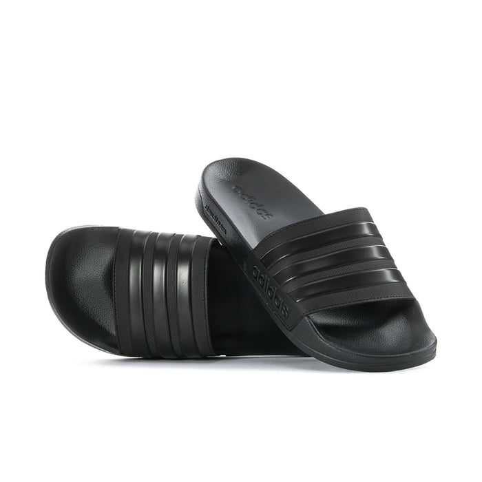 Black adidas slide sandals with three raised strap bands and textured footbed