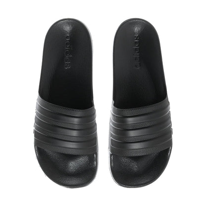Pair of black slide sandals with adidas branding on the strap and cushioned footbed