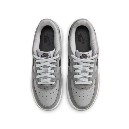 Youth Air Force 1 sneakers, back view, light smoke gray uppers with white laces