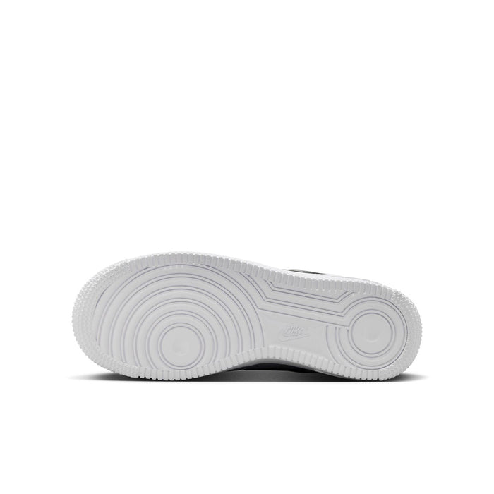 Youth Air Force 1 outsole view, white rubber tread with circular traction details