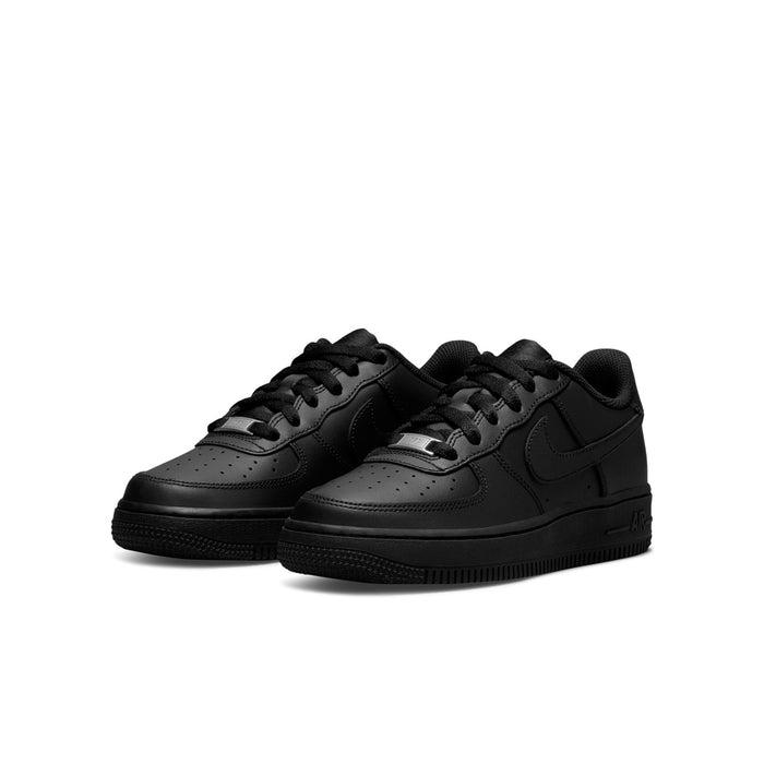 Black youth low-top sneakers, two views side-by-side, lace-up with textured panels
