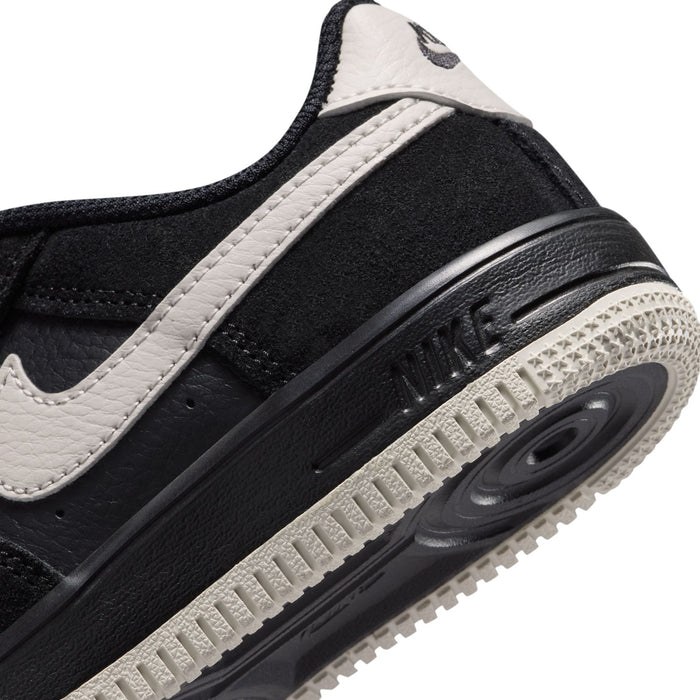 Air Force 1 midsole close-up, black foam with Air unit and light tread edge