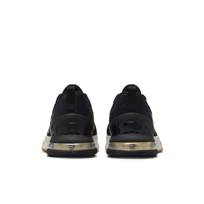 Black sneakers rear view with air-cushion heel and gold trim