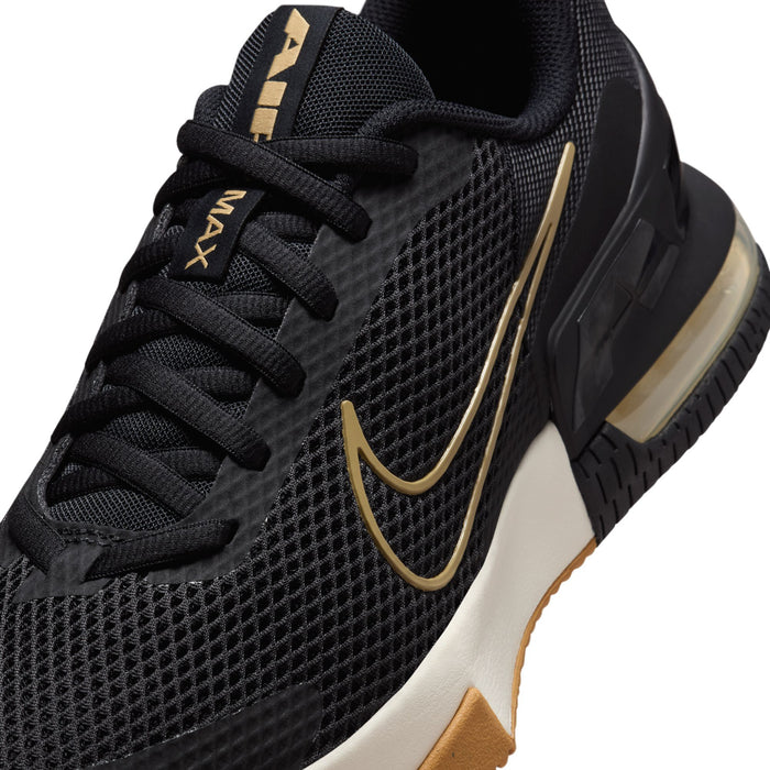 Black mesh upper detail with gold Nike swoosh, laces, and heel counter