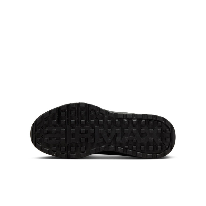 Youth black rubber outsole with textured tread pattern