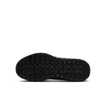 Youth black rubber outsole with textured tread pattern