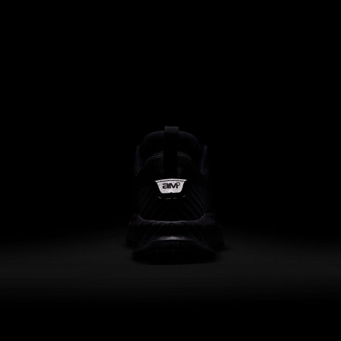 Youth black sneaker heel with branding on the back tab