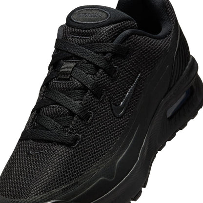Youth black mesh upper close-up with lace system and swoosh detail