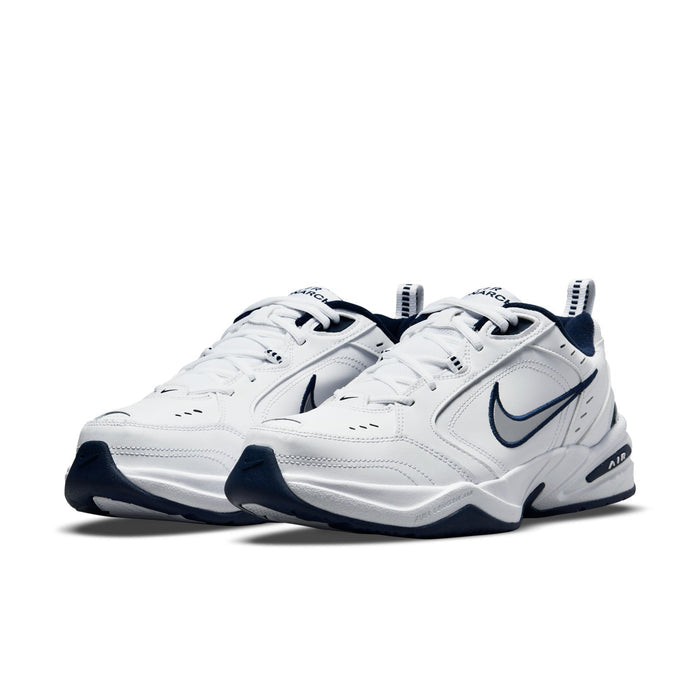 Men's white lace-up sneakers with navy swoosh and visible Air midsole