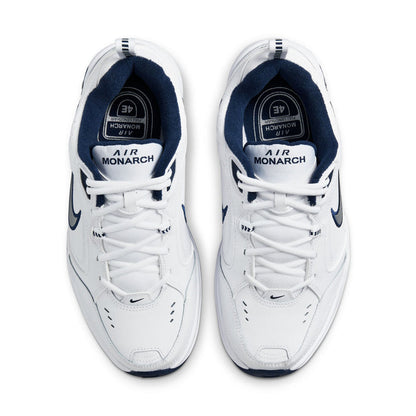 Men's white sneakers with navy padded collar and Air Monarch tongue label