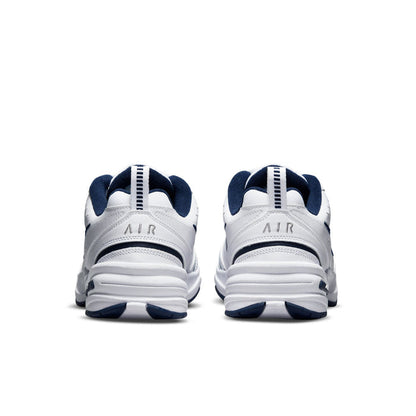 Men's white sneakers with navy heel tabs and stacked cushioned midsole