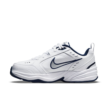 Men's white lace-up sneakers with navy swoosh and streamlined side panels
