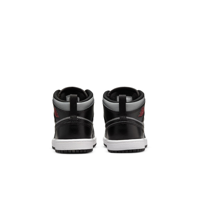 Kids black high-top sneakers with white midsole, Air logo on heel, lace-up