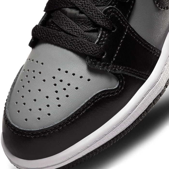 Kids black and grey high-top toe cap with perforations and white midsole edge