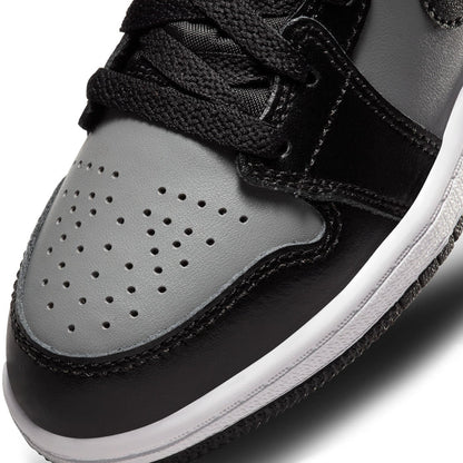 Kids black and grey high-top toe cap with perforations and white midsole edge