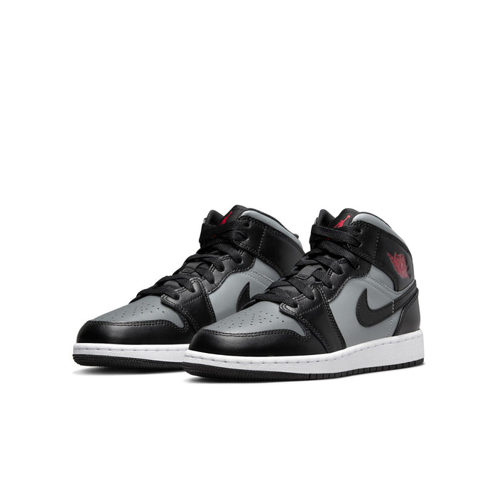 Youth mid-top sneakers, black and gray upper with white midsole and red logo detail