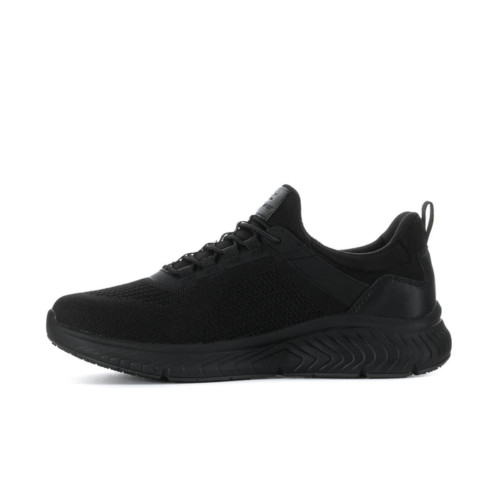 Men's black sneaker heel view with pull tab and sculpted rubber midsole