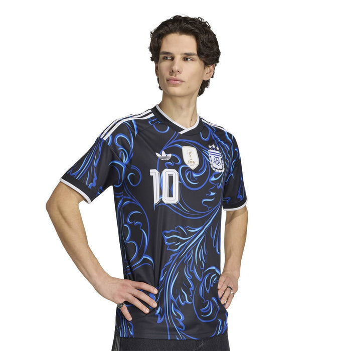 Black away soccer jersey with blue swirl pattern, white number 10, AFA/FIFA badges