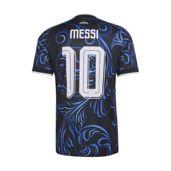 Black jersey rear close-up with blue swirls, white MESSI text and number 10